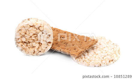Puffed rice snack and grain crisp bread. 10851289