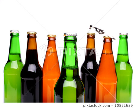 Top bottles of beer and a opener. Top bottles of beer and a opener. 10851689