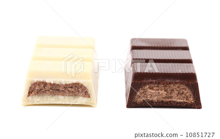 Slices of dark and white chocolate Slices of dark and white chocolate 10851727