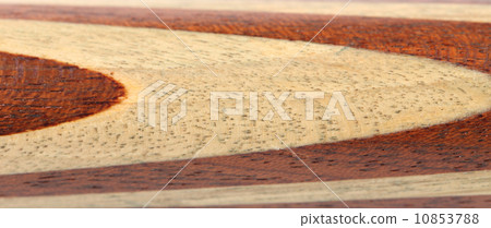 Beige and brown circles on wood. Beige and brown circles on wood. 10853788