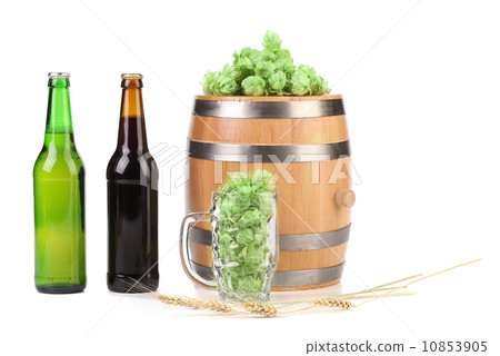 Barrel mug with barley hop and bottle of beer. 10853905