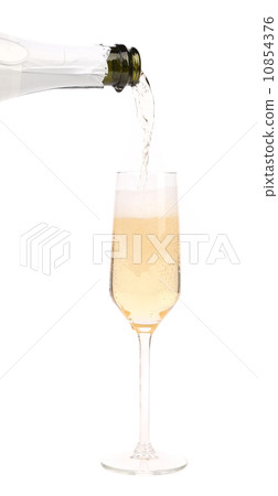 Champagne pouring in a glass. Champagne pouring in a glass. 10854376