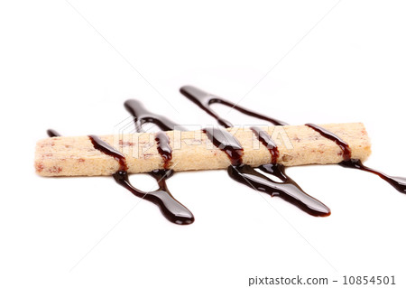 Stream chocolate on stics of biscuit. 10854501