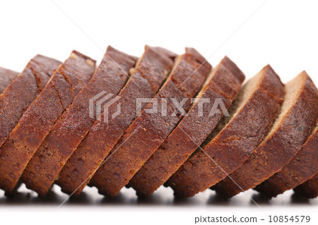 Close up of brown bread slices. 10854579
