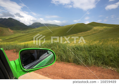 Car driving on mountain scenery 10859489