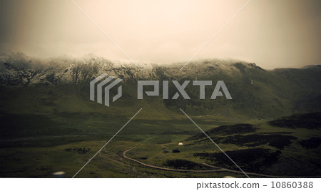 Snow covered hills quietly 10860388