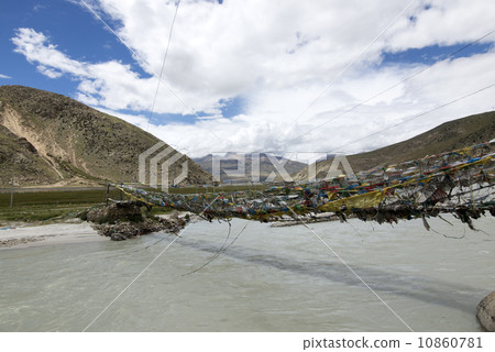 Rivers and prayer flags in Tibet, China 10860781