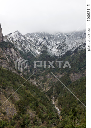 Snow covered hills 10862145