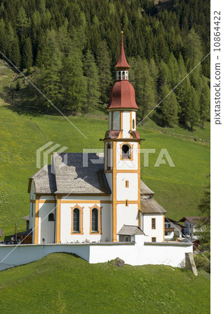The red roofed church in the Tirol region The red roofed church in the Tirol region 10864422