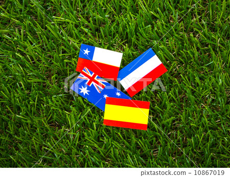 Paper cut of flags on grass for Soccer championship 2014 , group Paper cut of flags on grass for Soccer championship 2014 , group 10867019