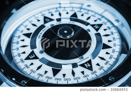 Naval compass. Blue toned monochrome macro photo Naval compass. Blue toned monochrome macro photo 10868955