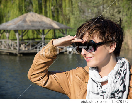 Woman looks into the distance 10870182