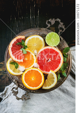 Set of sliced citrus fruits Set of sliced citrus fruits 10871172