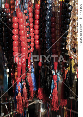 Prayer beads hanged on a wall Prayer beads hanged on a wall 10873409
