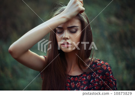 Portrait of young worried woman 10873829