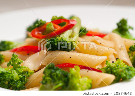 Italian penne pasta with broccoli and chili pepper Italian penne pasta with broccoli and chili pepper 10874648