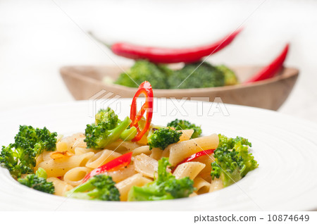 Italian penne pasta with broccoli and chili pepper Italian penne pasta with broccoli and chili pepper 10874649