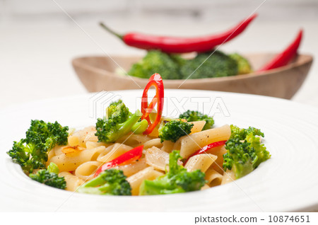 Italian penne pasta with broccoli and chili pepper Italian penne pasta with broccoli and chili pepper 10874651