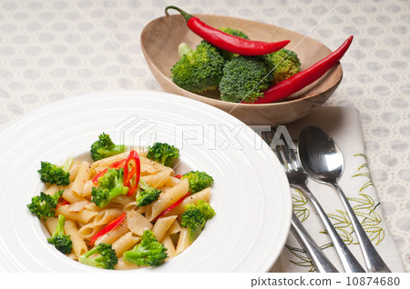 Italian penne pasta with broccoli and chili pepper Italian penne pasta with broccoli and chili pepper 10874680