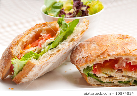 ciabatta panini sandwich with chicken and tomato ciabatta panini sandwich with chicken and tomato 10874834