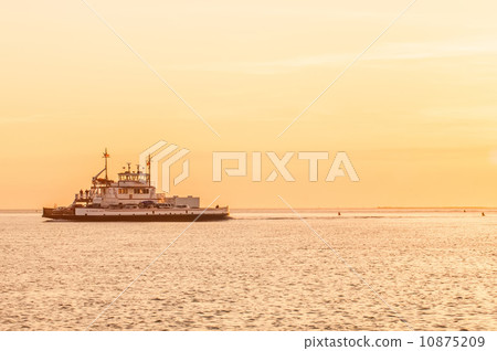 sunset on sea with ferry in distance sunset on sea with ferry in distance 10875209