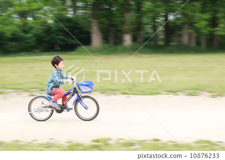 riding a bicycle 10876233