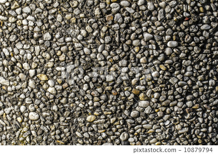 Old pebble stone wall pattern closeup 10879794