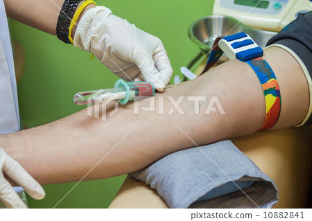 Nurse collecting a blood from a patient 10882841