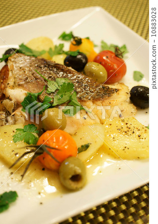 Oven baked with red snapper Izolana style 10883028