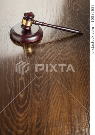Wooden Gavel Abstract on Reflective Table Wooden Gavel Abstract on Reflective Table 10883685