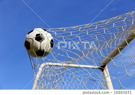foot ball in the goal net 10883831