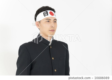 A young man in a run school run tightened with a headband 10886089