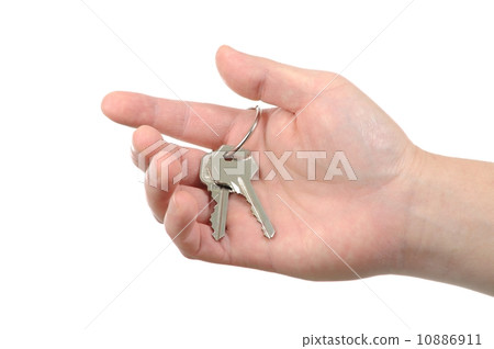 Business man holding key 10886911
