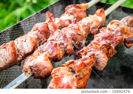 Hot shish kebab on metal skewers 10892478