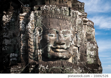 Huge carved Buddha faces of Bayon. Angkor Wat complex, Siem Reap, Cambodia 10892526