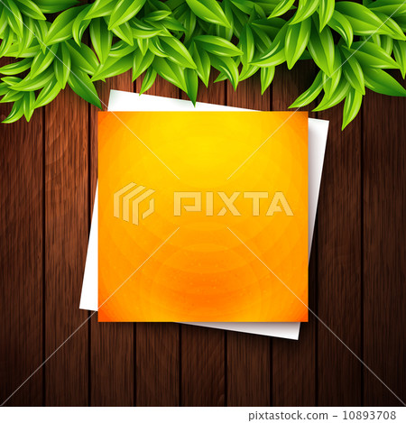 Abstract orange note paper on wooden background and leaves for y Abstract orange note paper on wooden background and leaves for y 10893708