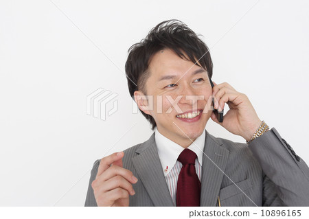 Middle-age salesman talking on smartphone Middle-age salesman talking on smartphone 10896165