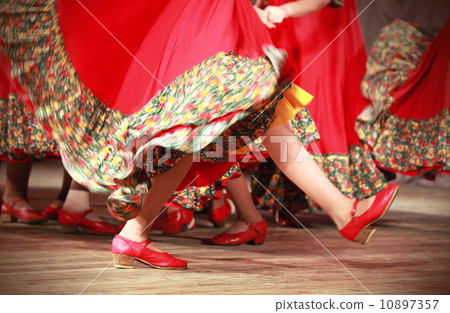 Bright fragment of fast Russian folk dance with red girls waved skirt 10897357