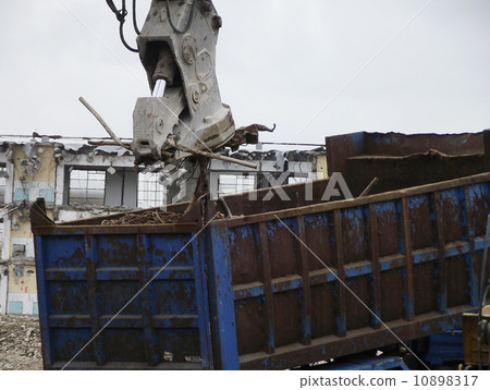 Scrap out at demolition work site 10898317