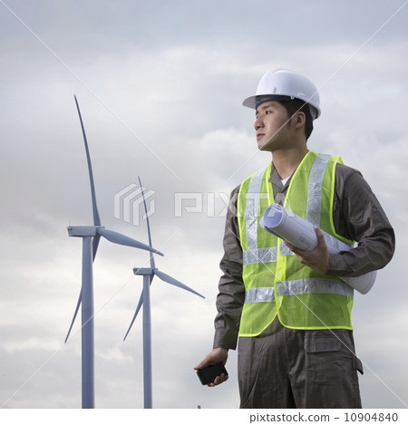 Asian industrial engineer checking winturbines 10904840