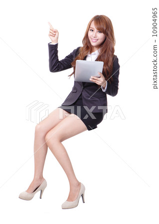 Happy business woman with touch pad 10904965