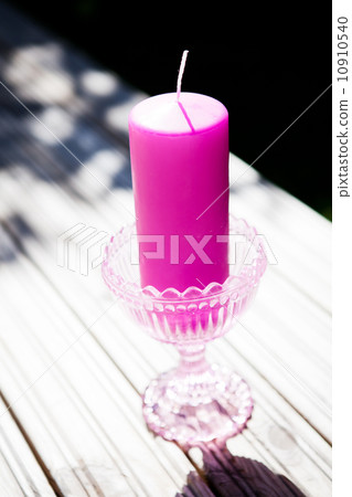 Decorative purple candle 10910540