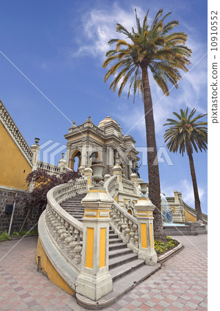 Santiago de Chile, old building with palms on the blue sky. Santiago de Chile, old building with palms on the blue sky. 10910552