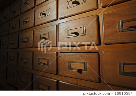 Old wooden card catalog, spot light. Old wooden card catalog, spot light. 10910594