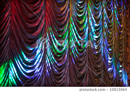 Illuminated colorful curtain background texture Illuminated colorful curtain background texture 10913064