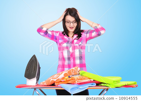 young girl ironing clothes young girl ironing clothes 10914555