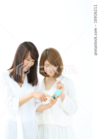 Smartphone · Two young women Smartphone · Two young women 10916211