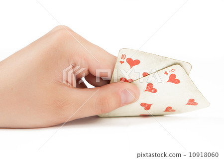 two playing cards in hand isolated on white background 10918060