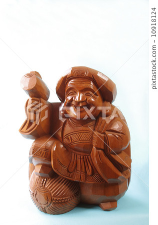 Stock Photo: the god of wealth, daikokuten, wooden