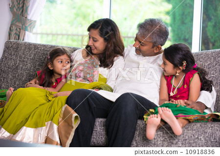 happy indian family enjoying quality time at home indoor happy indian family enjoying quality time at home indoor 10918836